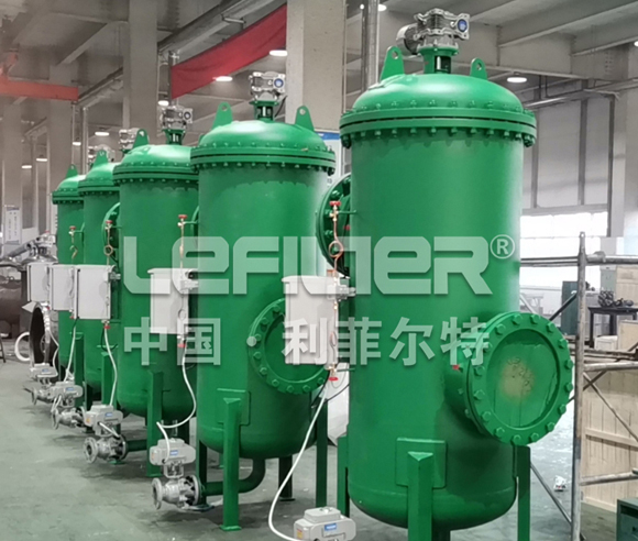 How do self-cleaning filters improve the efficiency of desalination system?